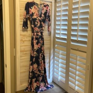 Soft and comfy maxi dress in beautiful navy, pinks, green, and white. Size Sm